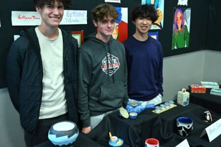 Students with their ceramics