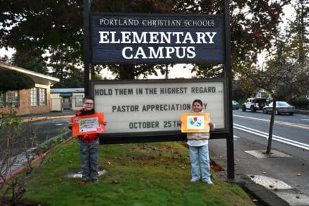 Pastor Appreciation sign with students